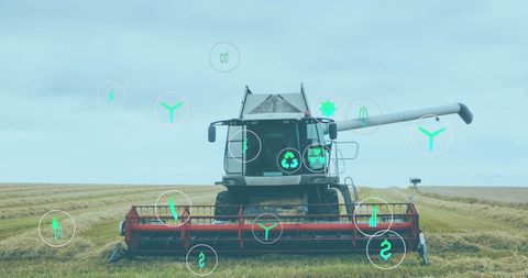 Modern Harvesting Machine in Field with Digital Icons Overlay - Download Free Stock Images Pikwizard.com