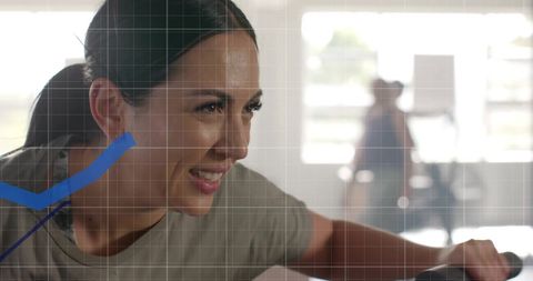 Smiling woman exercising with fitness technology overlay