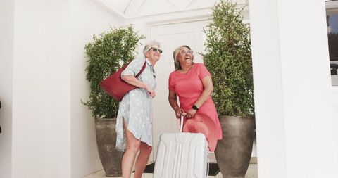 Joyful senior couple on vacation arrival