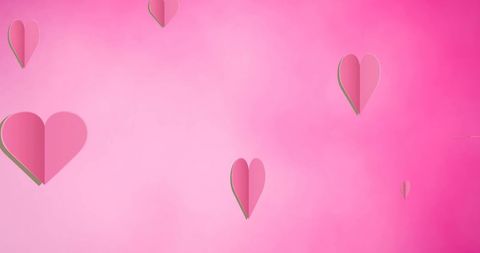 Falling Pink Hearts on Soft Pink Background Illustrates Romance - Download Free Stock Images Pikwizard.com