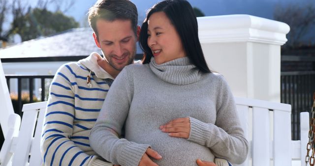 Happy Pregnant Couple Relaxing Together Outdoors - Download Free Stock Images Pikwizard.com