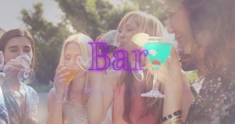 Diverse Friends Drinking Colorful Cocktails Outdoors