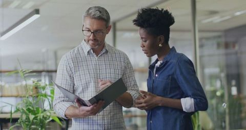 Mixed Ethnicity Professionals Collaborating in Modern Office
