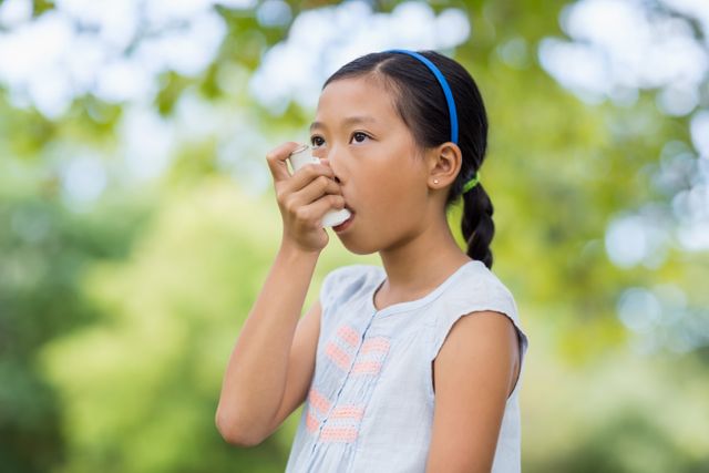 Young Girl Using Asthma Inhaler Outdoors - Download Free Stock Photos Pikwizard.com