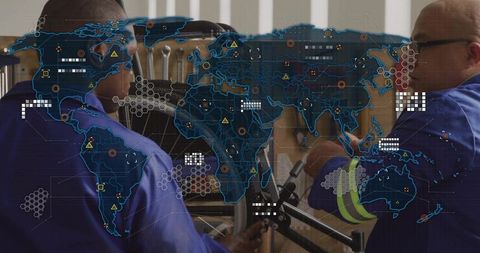 Technicians discussing network infrastructure with holographic map overlay