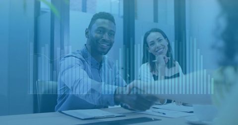 Diverse Business Meeting with Financial Analytics Overlay