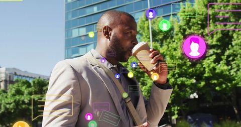 Professional man engaging in mobile communication while walking in urban area