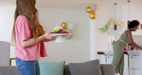 Couple Enjoys Celebratory Party in Domestic Setting