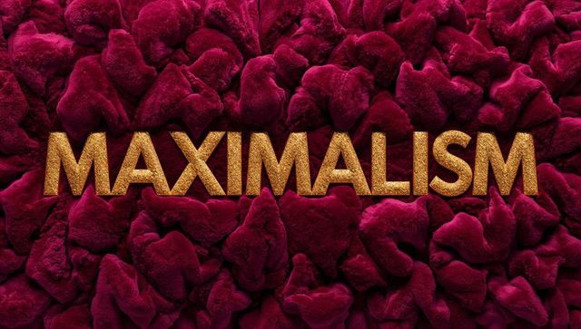 Golden maximalism lettering nesting in lush burgundy velvet tufts for luxury design
