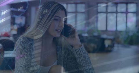 Woman in Office Using Smartphone amidst Digital Graphics