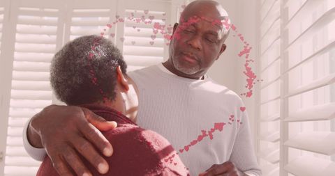 Senior African American Couple Embracing at Christmas