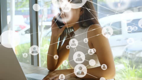 Businesswoman Connecting Networking Using Smartphone and Laptop