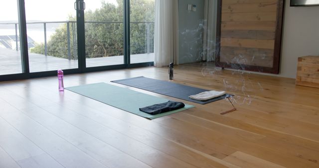 Tranquil Yoga Studio with Two Mats by Window Overlooking Nature - Download Free Stock Images Pikwizard.com