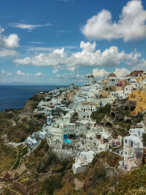 Picturesque Greek Island of Santorini with White Buildings and Sea View - Download Free Stock Images Pikwizard.com