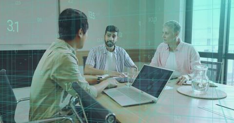 Professionals Analyzing Data Overlays in Modern Office Setup