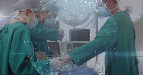 Surgeons Performing Complex Operation in Operating Room