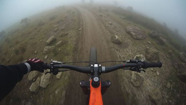 Riding through fog on rocky moorland singletrack | first-person mountain bike adventure