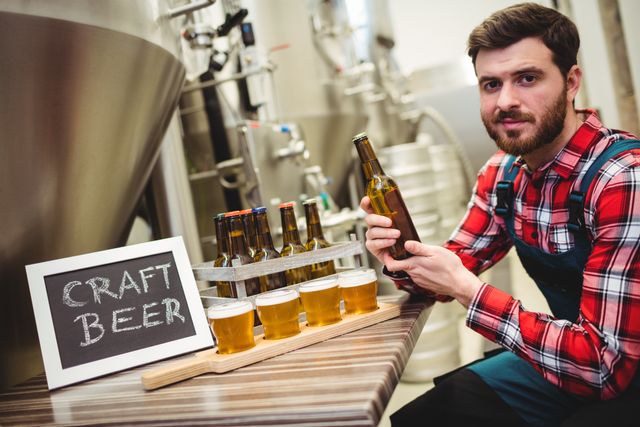 Manufacturer Examining Beer in Brewery - Download Free Stock Photos Pikwizard.com