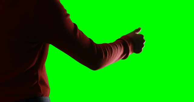 Person Giving Thumbs Up Gesture Against Green Screen - Download Free Stock Images Pikwizard.com