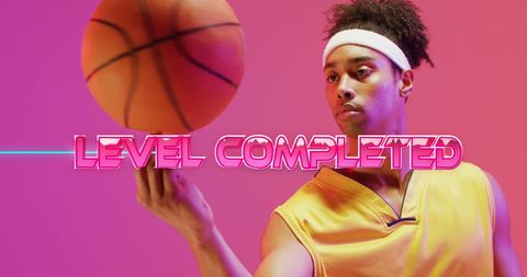 Basketball Player Celebrates Virtual Game Level Completion - Download Free Stock Images Pikwizard.com