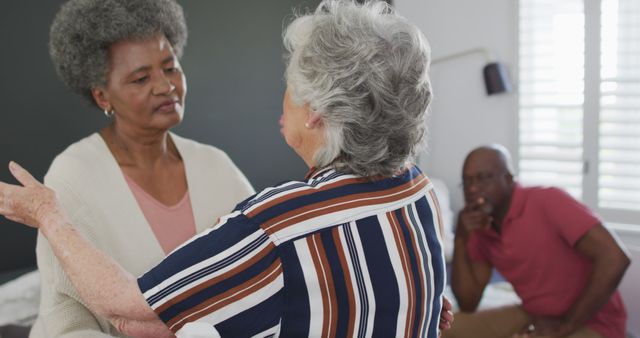 Senior Friends Comforting Each Other While Sitting at Home - Download Free Stock Images Pikwizard.com