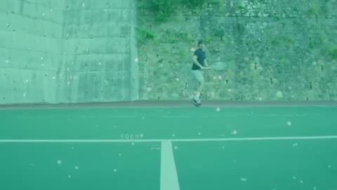 Male Tennis Player Analyzing Performance with Data Technology