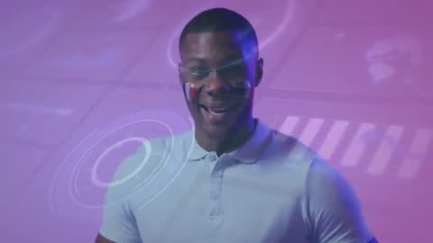 Young Man Presenting Digital Interface with Futuristic Data Visualization