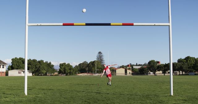 Young Rugby Player Practicing Kicking on Field - Download Free Stock Images Pikwizard.com