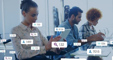 Diverse workforce using digital devices with social notifications