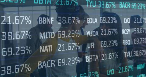 Businesspeople Analyzing Financial Data in Office Environment