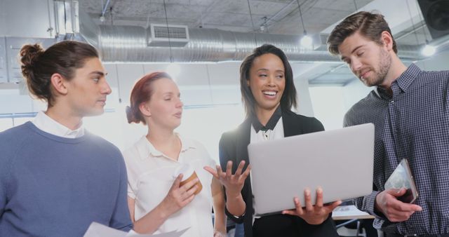 Diverse Team Collaborating in Modern Office with Laptop - Download Free Stock Images Pikwizard.com