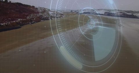 Aerial hud overlay tracking low-tide coastal shoreline with radar interface for mapping