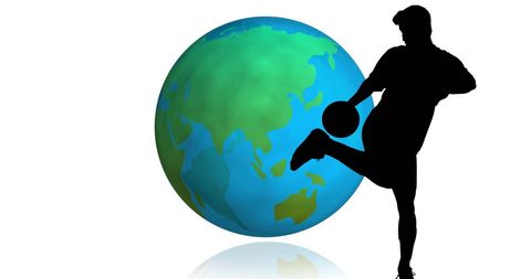 Football Player Silhouette Kicking Ball by Globe