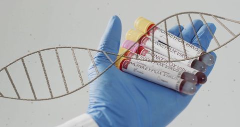 Dna strand and blood samples representing viral research concept