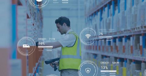 Warehouse Worker Digitally Scanning Inventory for Logistics Efficiency