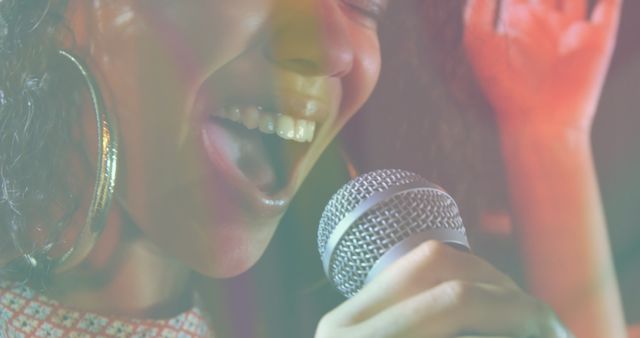 Woman Singing Joyfully into Microphone - Download Free Stock Images Pikwizard.com