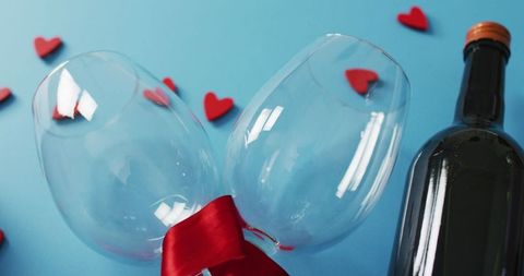 Romantic Wine Glasses and Bottle with Scattered Hearts - Download Free Stock Images Pikwizard.com