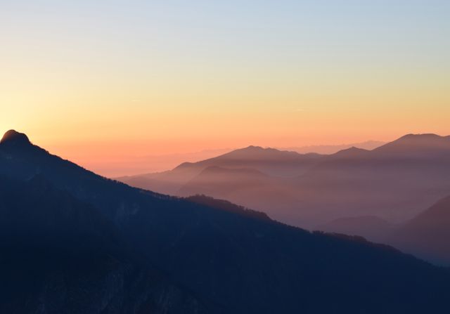 Serene Mountain Range at Sunrise - Download Free Stock Photos Pikwizard.com