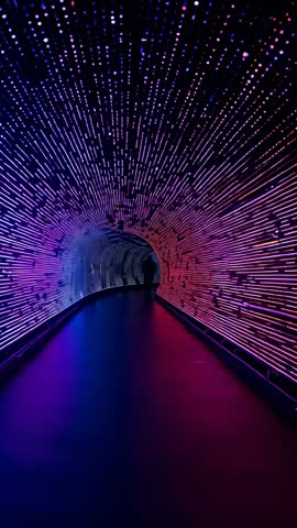 Vertical LED Tunnel Walkthrough with Silhouette Couple in Neon Radial Light Installation