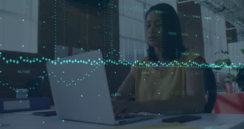 Asian Woman Analyzing Data on Laptop with Digital Graph Overlay