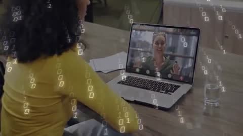 Woman Engaging in Virtual Meeting with Laptop and Code Graphics