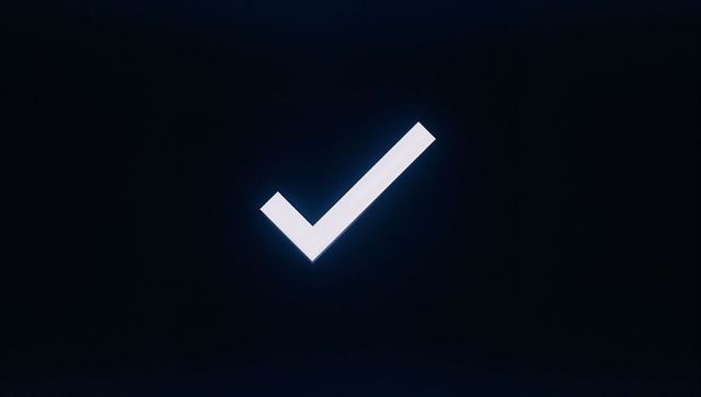 White check mark icon on dark digital screen