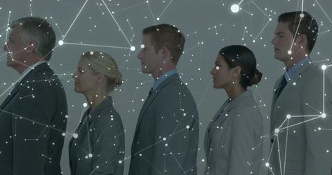 Teamwork networking concept with corporate professionals linked by glowing nodes