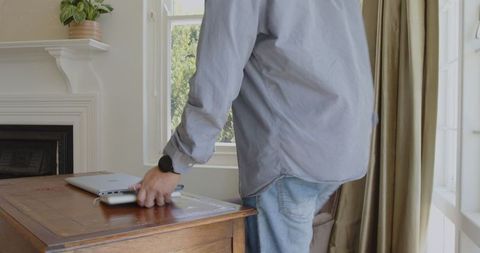 Man home office focused remote work task concentration