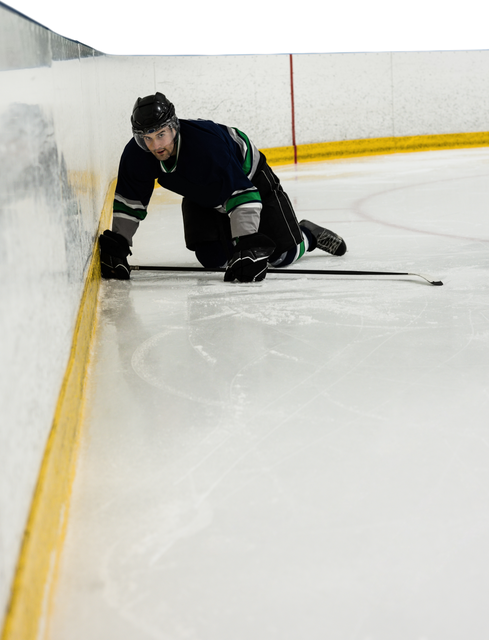 Professional Ice Hockey Player Kneeling on Ground in Action Transparent - Download Free Stock Videos Pikwizard.com