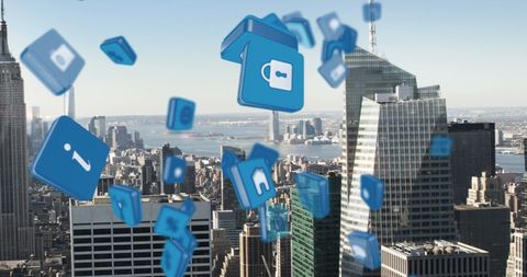 Digital Social Media Icons Over City Skyline