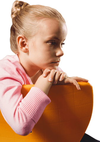 thoughtful girl resting over back of transparent yellow chair - Download Free Stock Videos Pikwizard.com