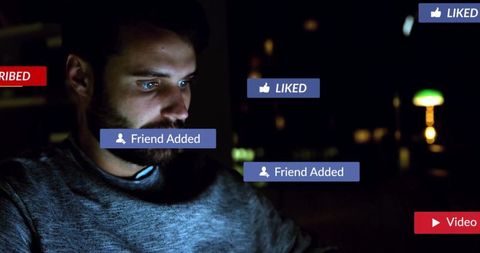 Man Scrolling with Floating Social Media Icons at Night