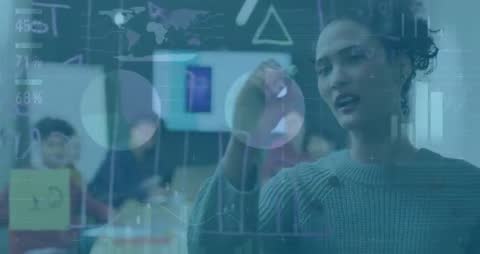 Woman Presenting Data Insights on Glass Wall in Office