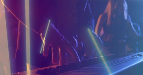 Playing Synth Keyboard in Neon Club with LED Light Bars, Haze, and Electronic Groove